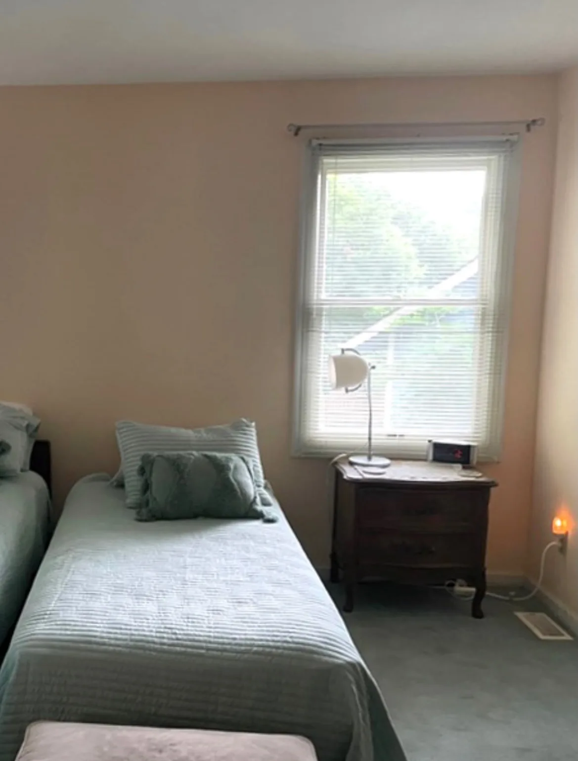Before: bedroom in dated cream