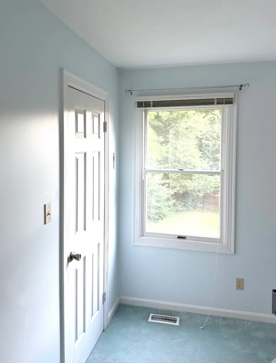After: hallway and door trim in light blue and white