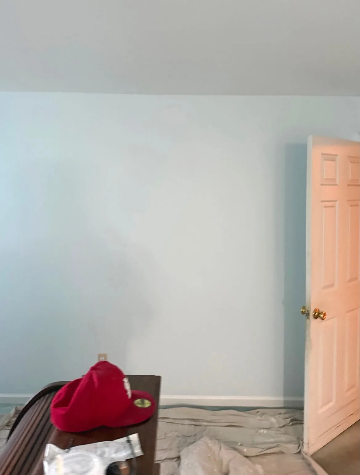After: bedroom corner with fresh trim