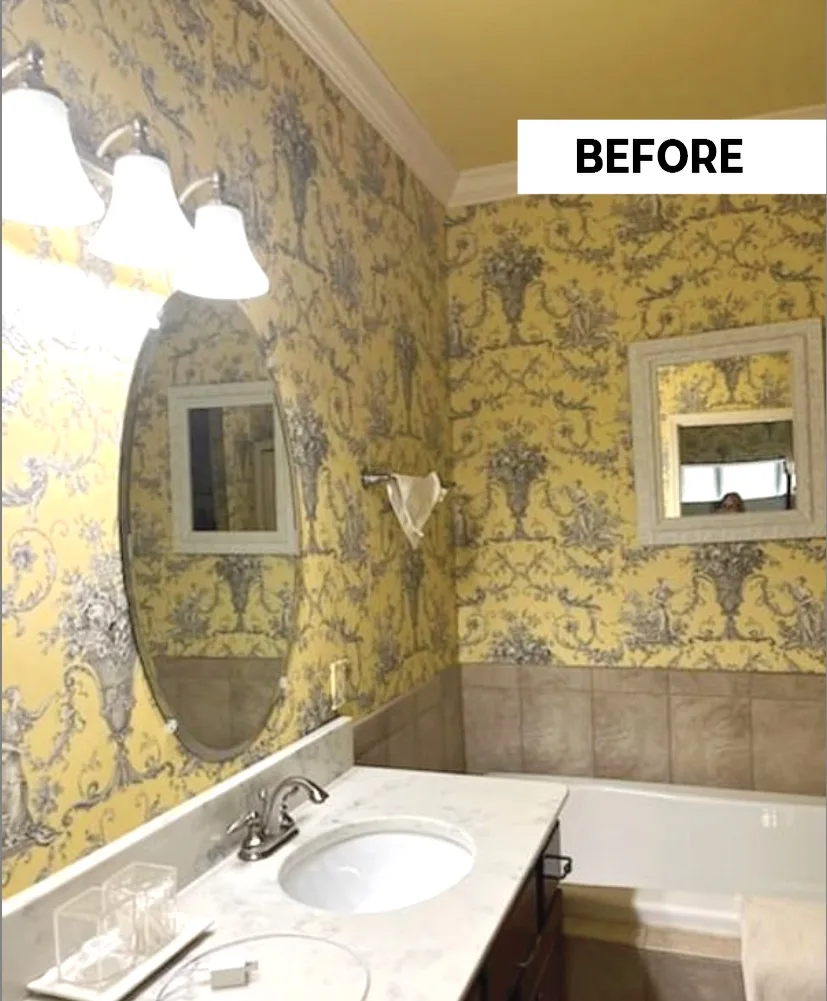 Before: yellow patterned wallpaper around the vanity