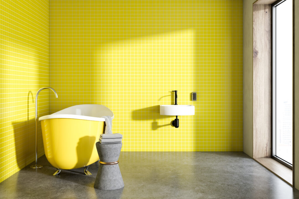 Yellow bathroom with a chiar